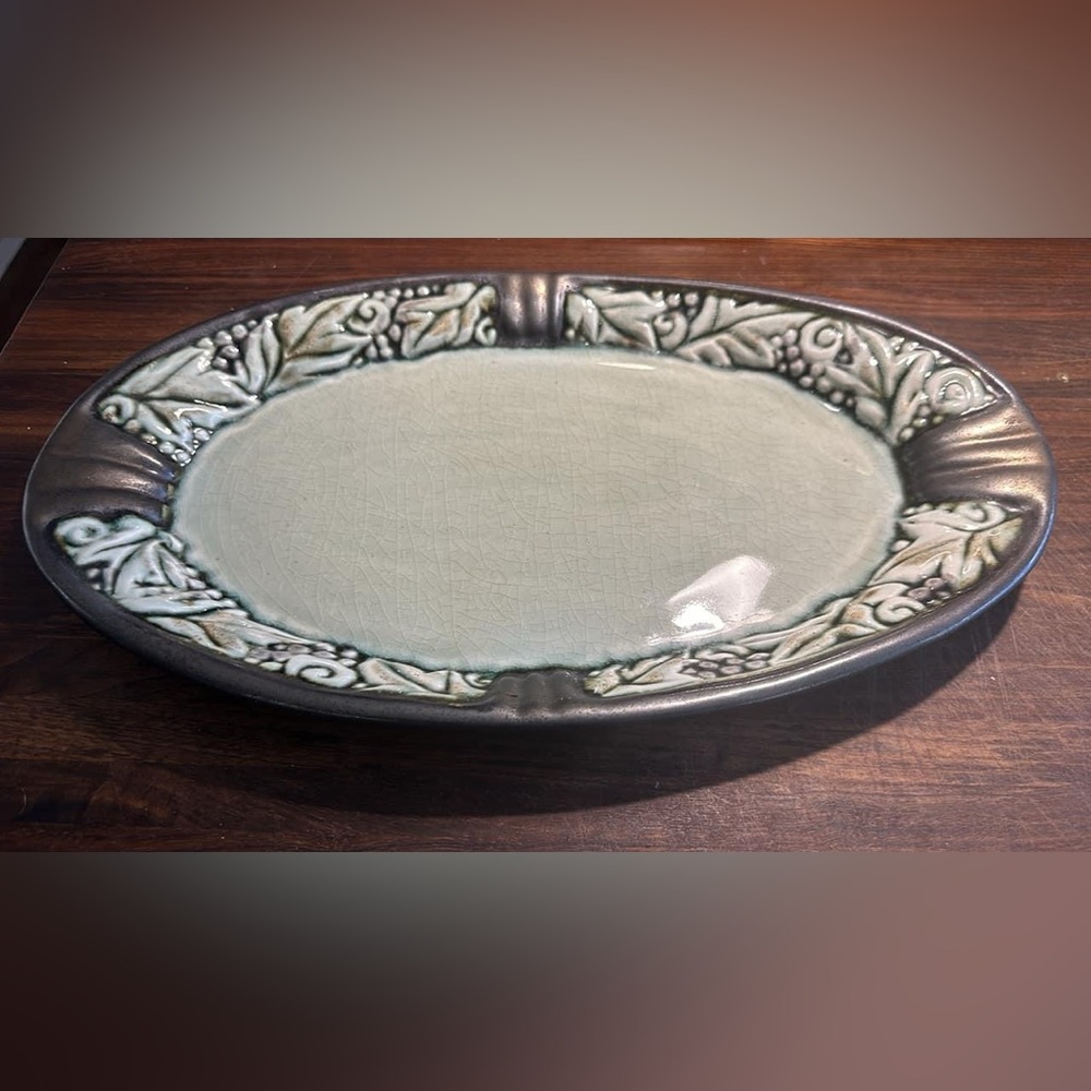 Sculpted pottery serving plate